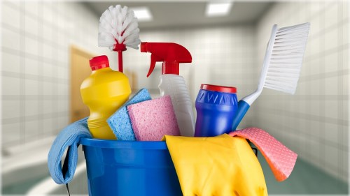 Professional cleaners working in a Wimbledon home interior